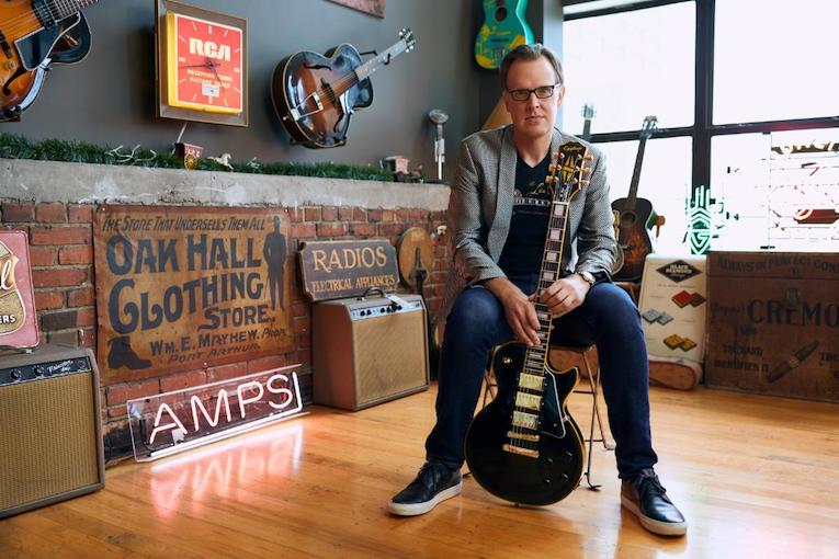 Joe Bonamassa holds new Epiphone Les Paul Custom Black Beauty photo