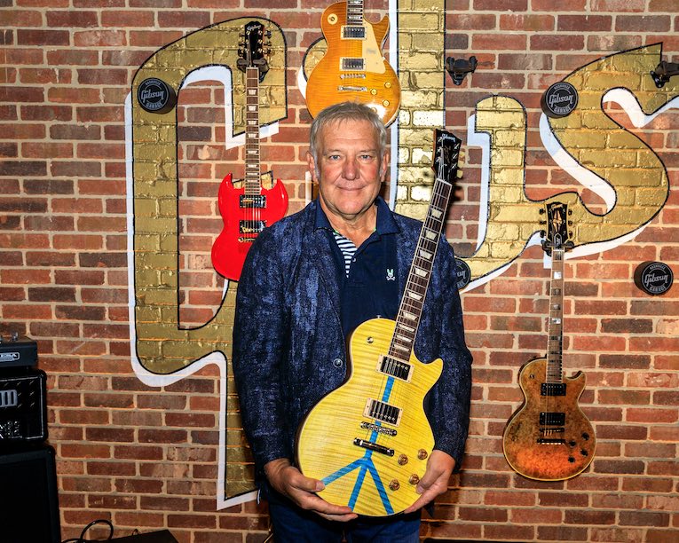 Alex Lifson of RUSH, Gibson Ukraine Guitars For Peace photo