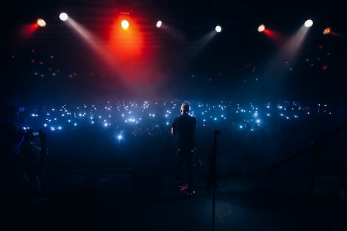 singer, concert crowd, cell phones, photo